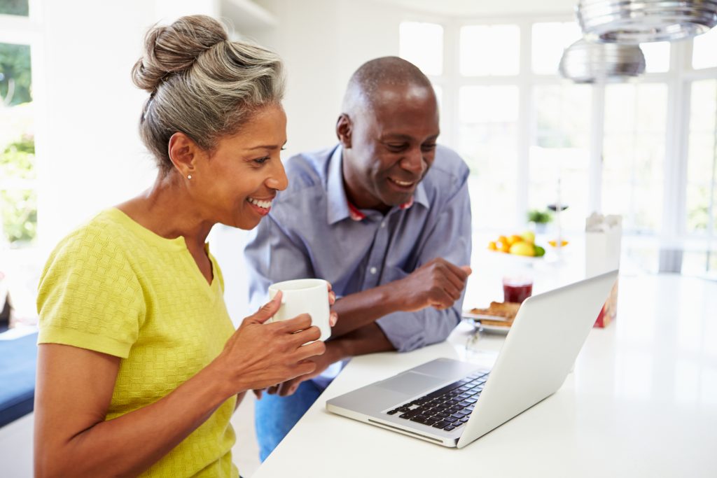 older couple looking at laptop